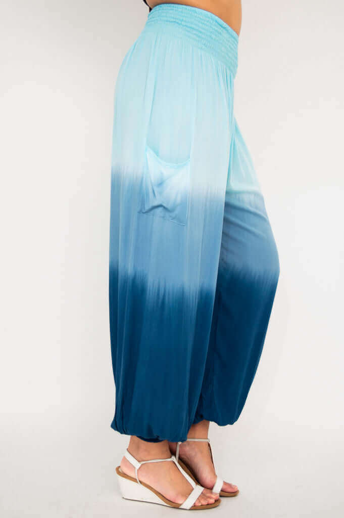 Side pocket view of Embra ombre blue pants with gathered waistband