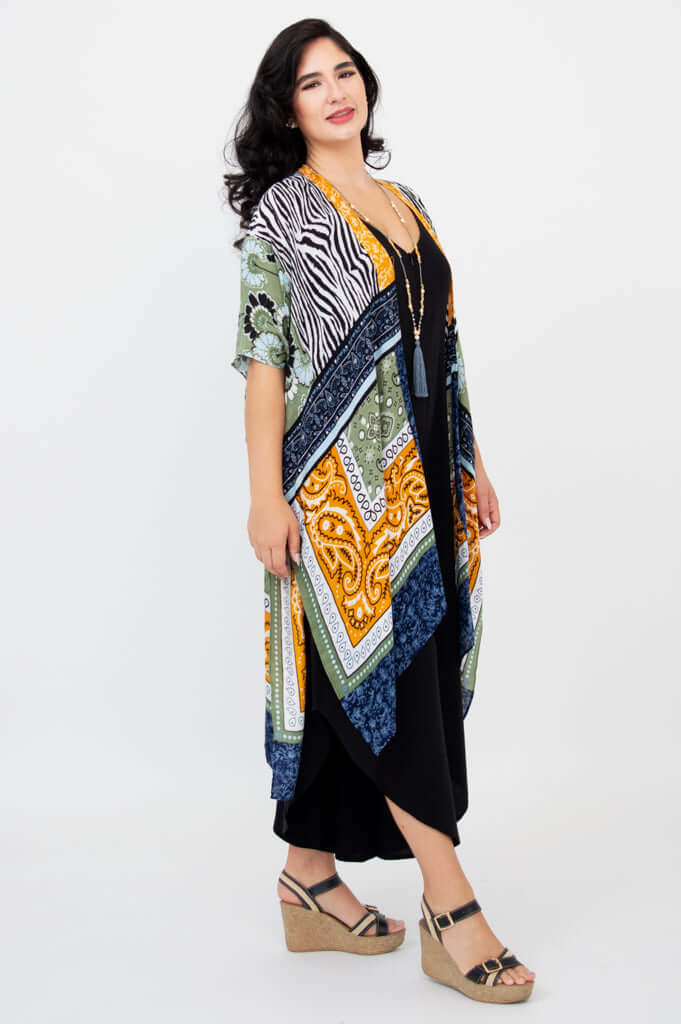 Side view of model showing length and drape of Darcy kimono wrap