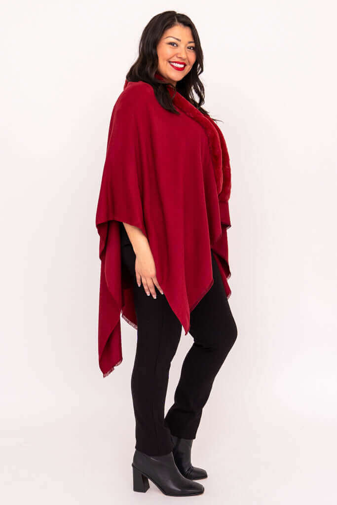 Side view of woman in scarlet wrap showcasing elegant cut