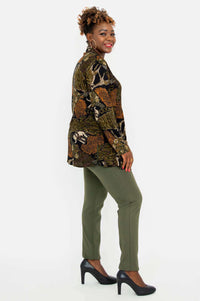 Side profile of model in Cindy safari print tunic and olive pants