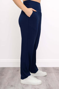 Side view of Clair Bamboo Pants showing tapered leg and pocket detail
