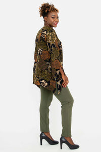 Side view of model wearing Dorothy safari print top and olive pants