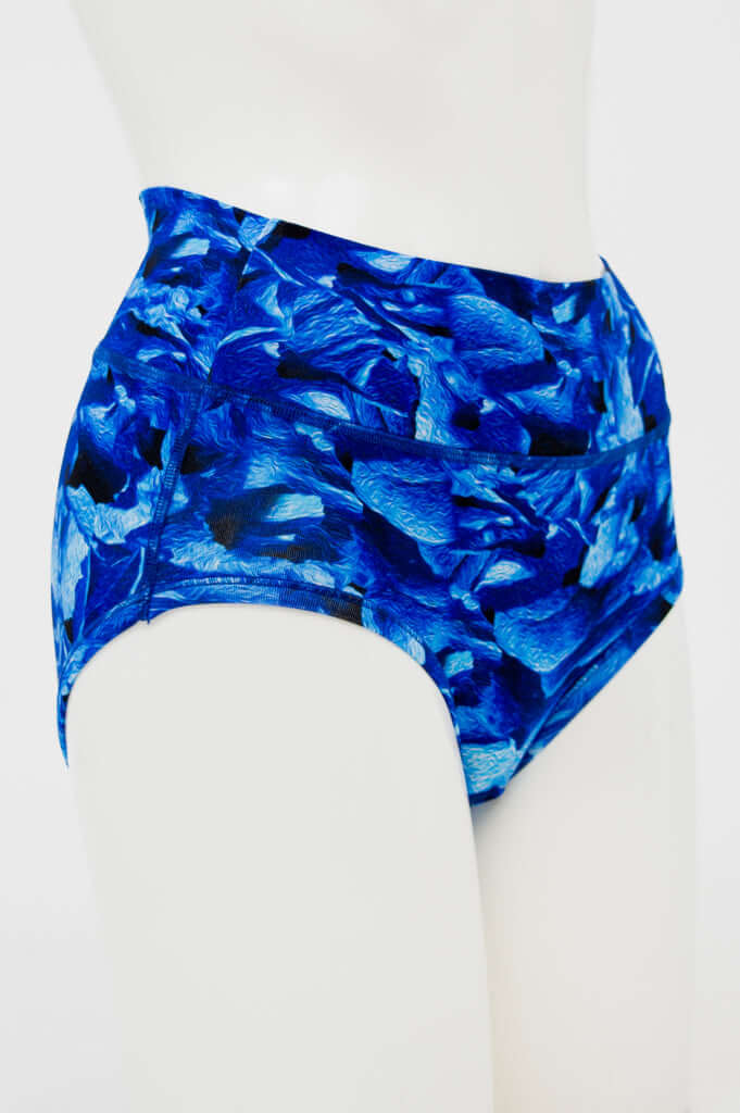 Side view of La Gaunche classic brief in blue abstract print on mannequin
