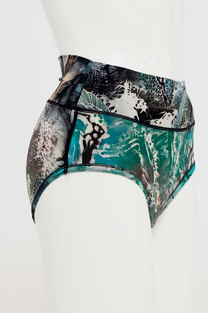 Side view of La Gaunche high-waist brief showing wide waistband