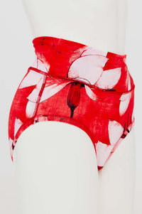 Side view of La Gaunche high-waisted red floral brief on mannequin