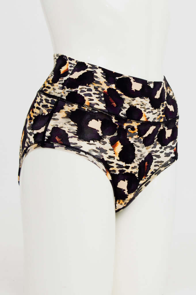 Side angle of leopard print high-waisted brief underwear on mannequin