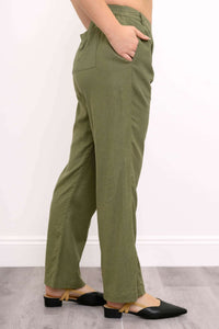 Side view of olive green pants showing elastic back waistband and pocket detail