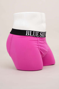 Side angle of hot pink boxer briefs with black waistband on mannequin