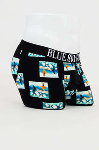 Side angle of Middle Man Underwear showcasing ocean-themed print and BLUE SKY GUY waistband