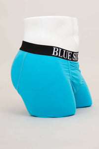 Side view of bright blue bamboo boxer briefs highlighting supportive pouch