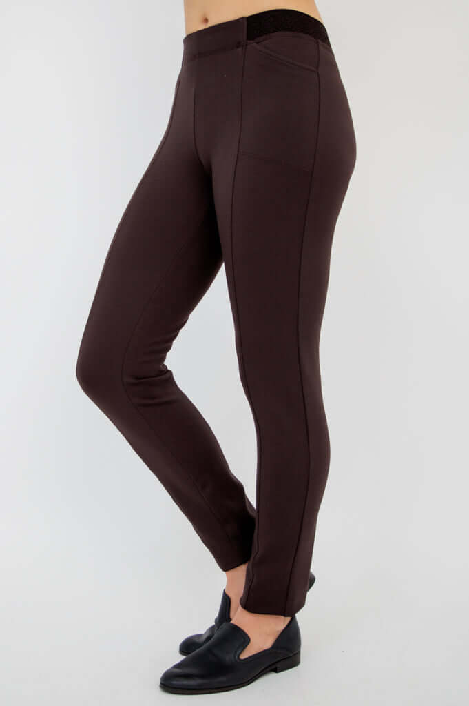 Side view of Nadia slim-line pants in brown showing seaming and flexible fit