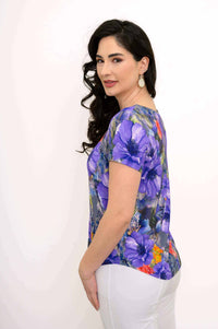 Side view of Ritzy Short Sleeve Top showing fluid hemline and floral design