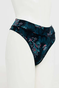 Side view of bamboo high rise thong underwear with floral print on mannequin