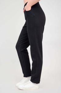 Side view of black bamboo fleece track pants showing pocket and fit