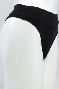 Side view of black bamboo high rise thong underwear on mannequin