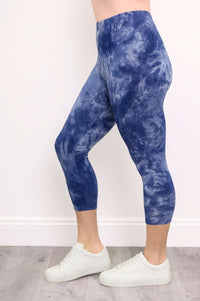 Side view of blue tie-dye capri leggings