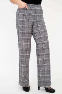 Side angle of high-waisted plaid trousers with pockets