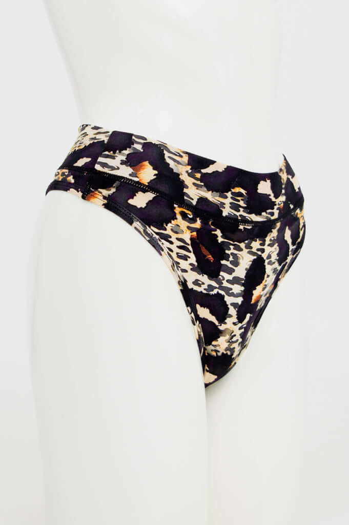 Side view of high rise bamboo thong showing waistband and cut