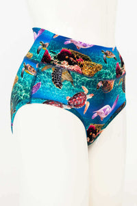 Side view of high waist brief featuring sea turtle and coral reef pattern