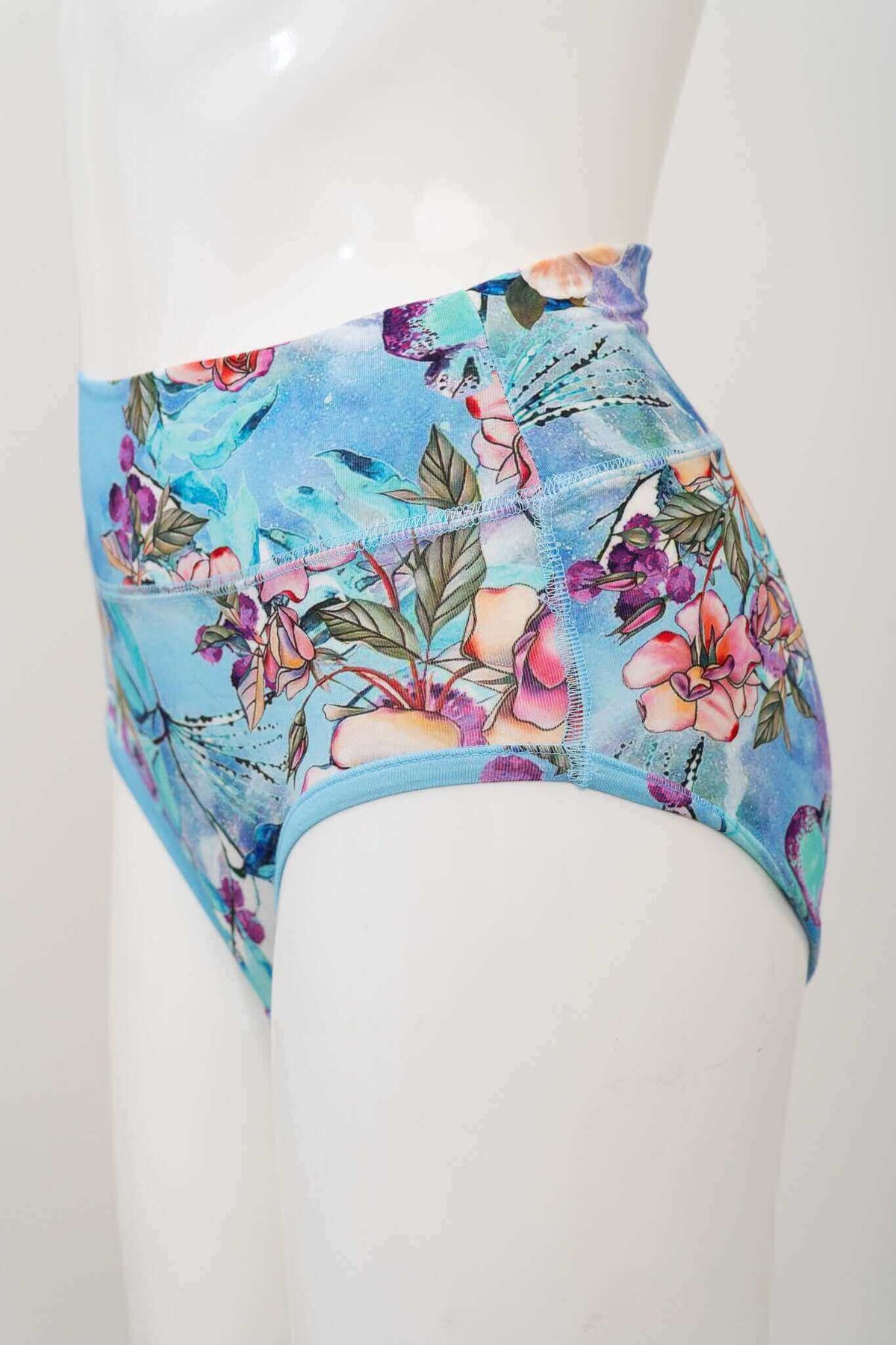 Side view of high waisted bamboo brief with artistic floral print