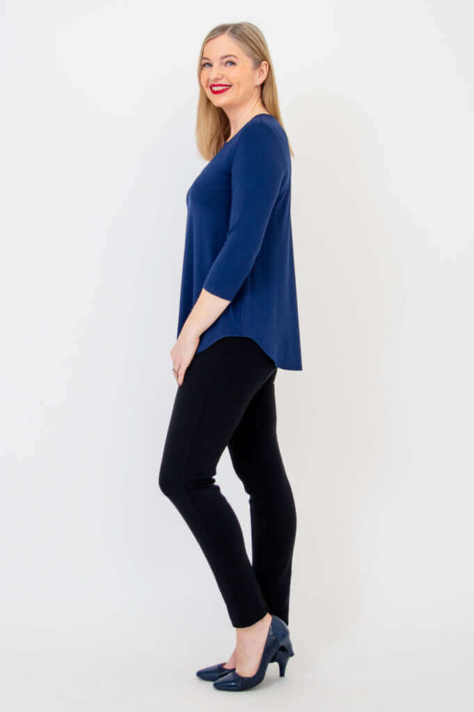 Side view of navy V-neck bamboo top showing A-line shape