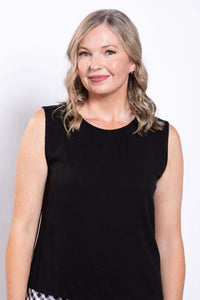 Front view of woman in sleeveless black gathered-neck tank