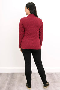 Back view of a red patterned bamboo knit jacket, showcasing clean vertical seams and a straight back hemline.