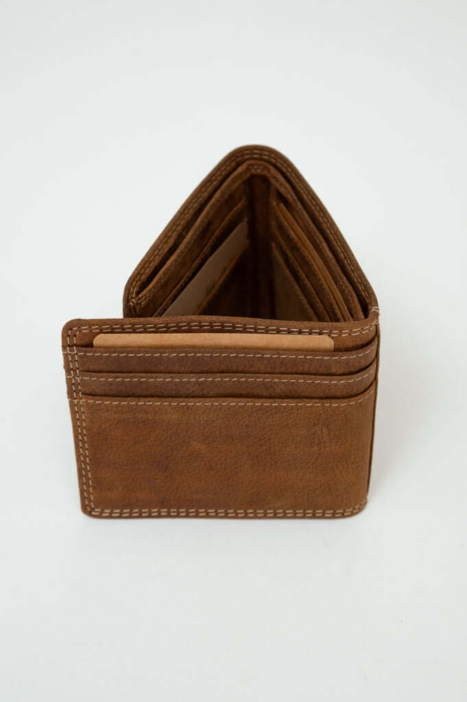 Brown leather wallet standing open displaying its slim profile and card slots