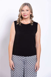 Black gathered-neck tank with checkered pants, straight-on front view