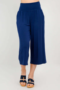 Straight-on view of royal blue gaylene capri pants showing flowy bamboo fabric