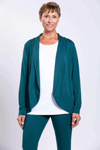 Woman wearing a teal French Terry jacket with shawl collar and open front