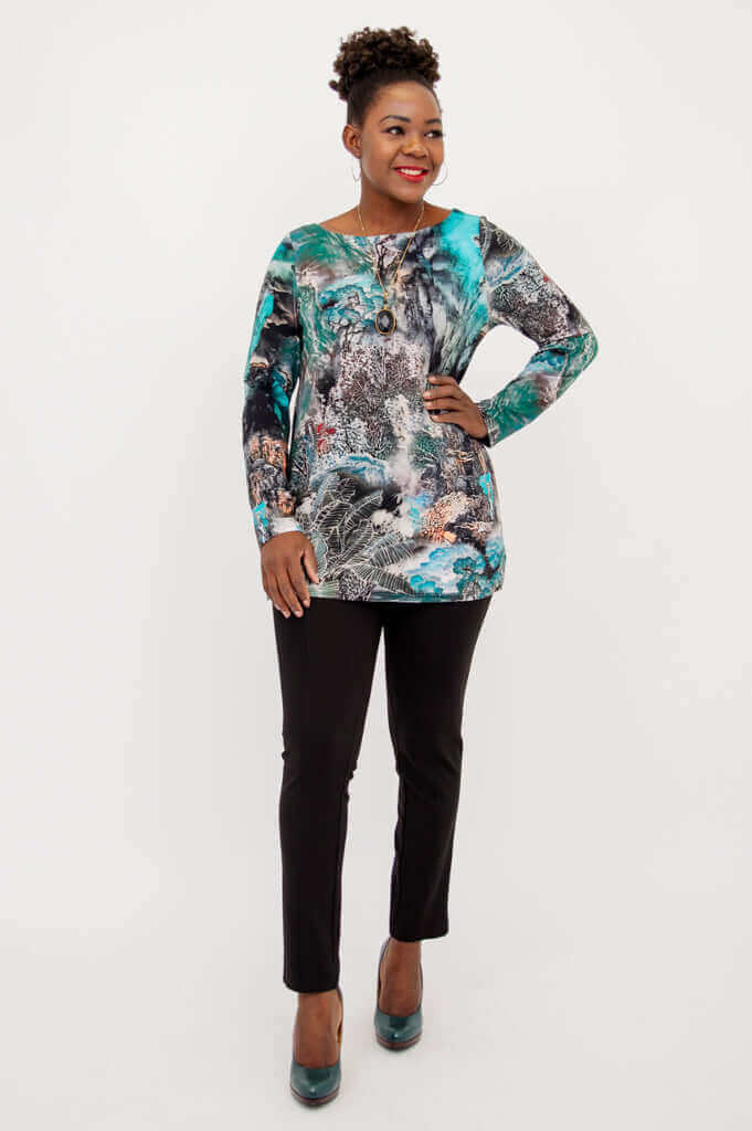 Three-quarter view of model in cheerful bamboo boatneck top and pants