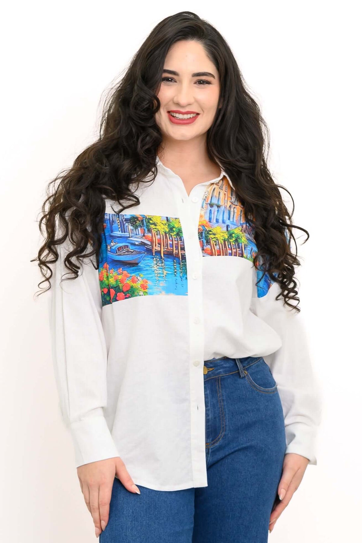 Woman smiling in Venice cityscape print white blouse