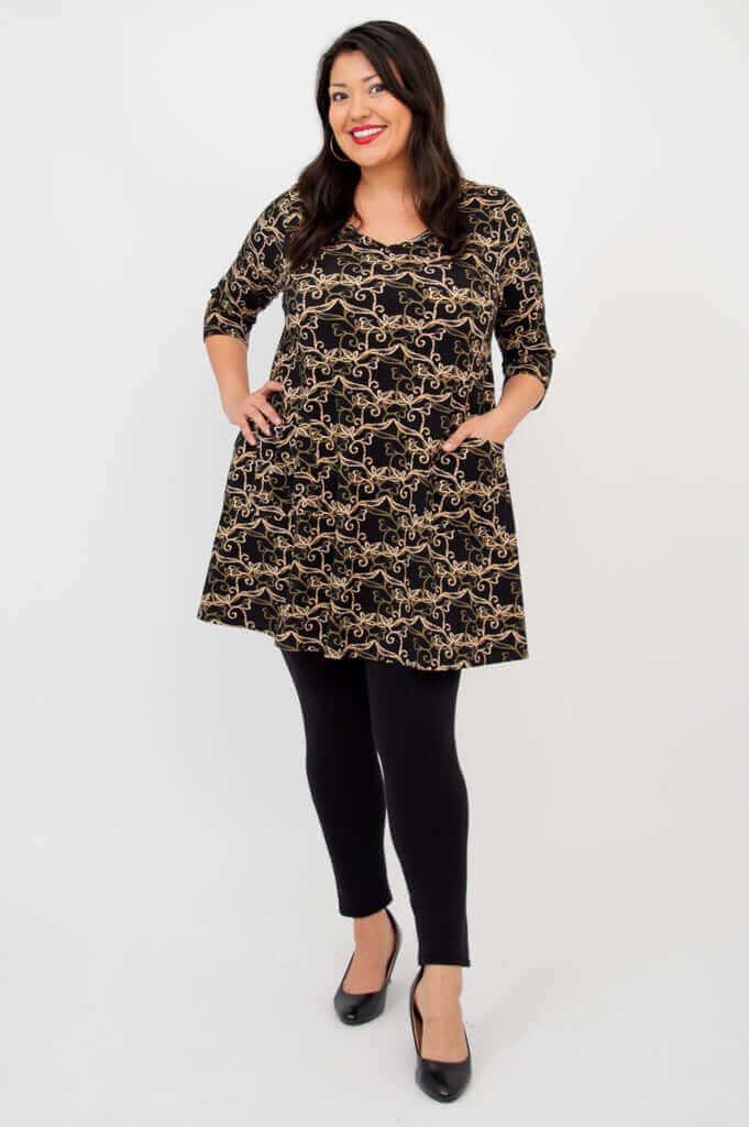 Three-quarter view of model in Veronica A-Line Tunic with pockets