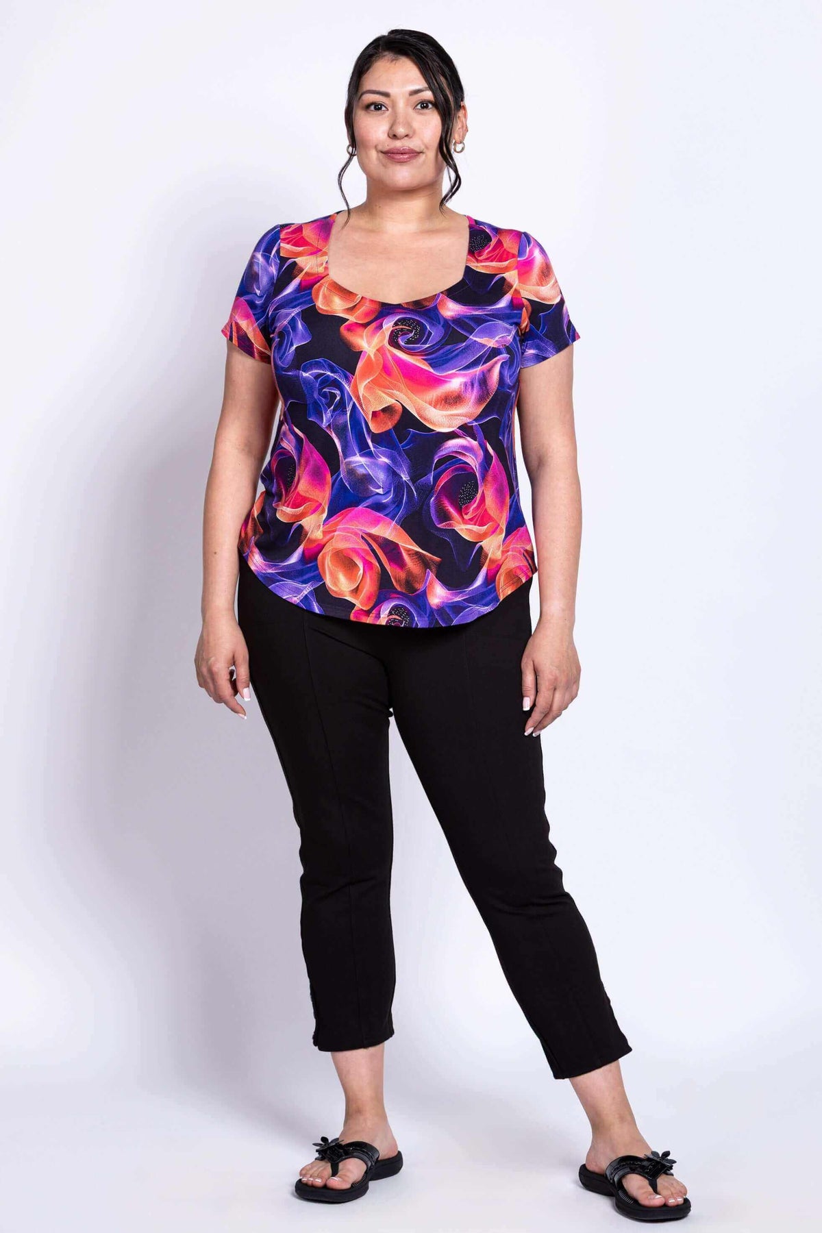 Model in Ritzy Short Sleeve Top showing relaxed fit and vivid abstract print