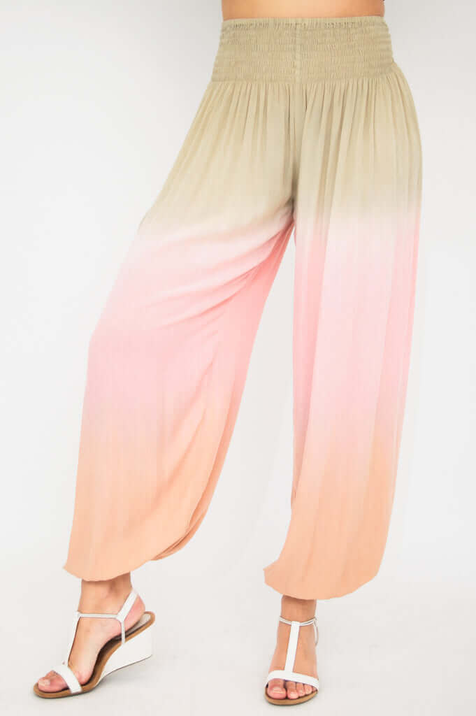 Wide-leg ombre pants with high elastic waistband in beige, pink, and peach tones