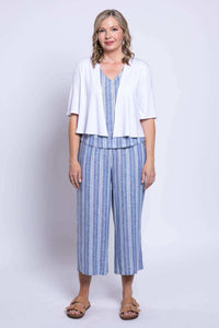 Woman wearing Landon cropped capri pants, matching top, and white cardigan