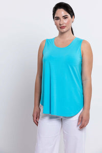 Woman wearing aqua blue bamboo tank top with relaxed fit