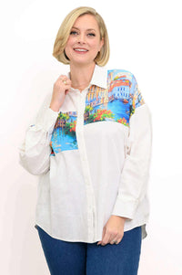 Woman wearing the Alex Blouse, a white shirt with a colorful artistic yoke print