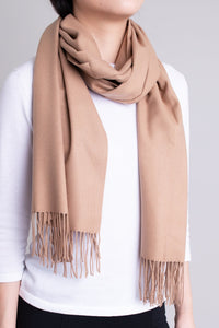 Women's beige cozy warm scarf.