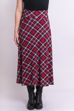 Women's red plaid long skirt with wide stretchy waistband and pockets, made with natural bamboo fibers.