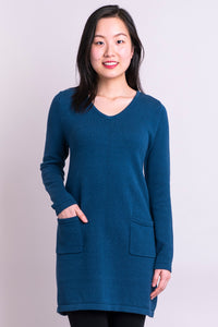 Women's blue tunic long-sleeve V-neck sweater dress with two front pockets.