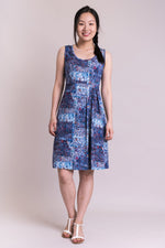 Women's blue summer print sleeveless short summer dress with round neckline, made with natural bamboo fibers.