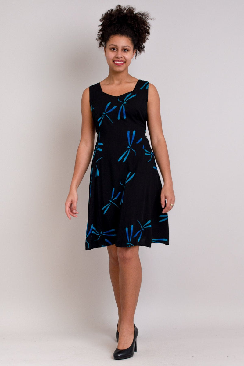 Women's blue dragonfly print knee-length sleeveless dress with sweetheart neckline and pockets.